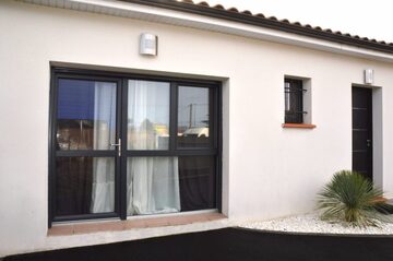 Transformez votre garage en un espace de vie fonctionnel avec PVC & ALU SYSTEM FENETRIER VEKA !